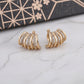Golden Wave Studs Earrings jewellery product view 3